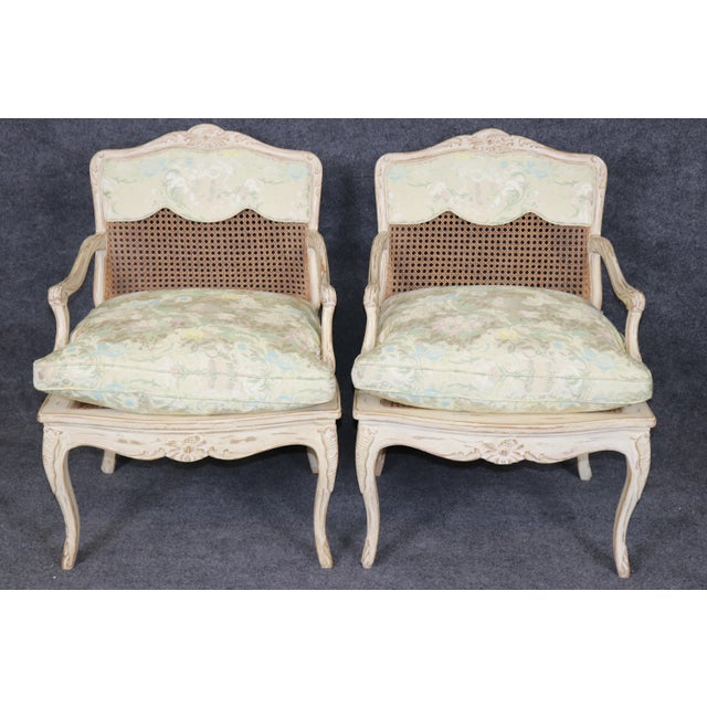 elegant, timeless, and effortlessly sophisticated, this exceptional pair of French Louis XV style armchairs embodies the...