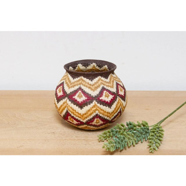 This one of a kind stunning basket with rounded shape and wide opening is Handcrafted by Emberá artisans using the...