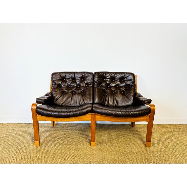 Elegant vintage scandinavian two-seater sofa in excellent condition, dating from the 1960s. bent oak frame with teak...