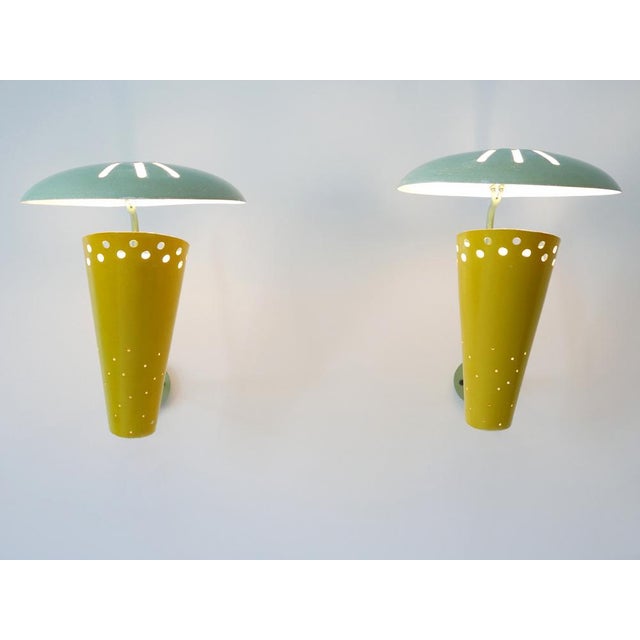 Set of two extremely rare, large and highly decorative mid-century modern sconces or wall lamps. Manufactured in germany,...