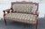 Gorgeous Arts & Crafts settee love seat made of cherry featuring a lovely shaped back over a large comfortable seat,...