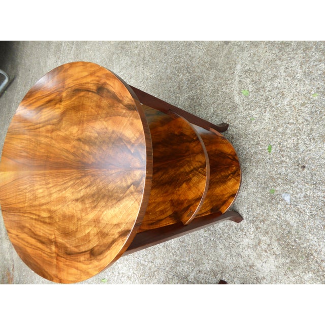 Exquisite French walnut matching oval side tables. A splendid 3 tier pair. Wonderful tight curly grain. Gently sweeping...