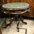 Bring timeless French elegance into your home with this exquisite Louis XVI-inspired round side table. Crafted from...
