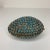 This exquisite Tibetan gau (also spelled ghau) prayer box is richly adorned with dozens of turquoise colored cabochons...