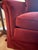 A curved mid-century sofa upholstered in a rich maroon Dutch cotton velvet. Solid wood frame. Includes four matching...