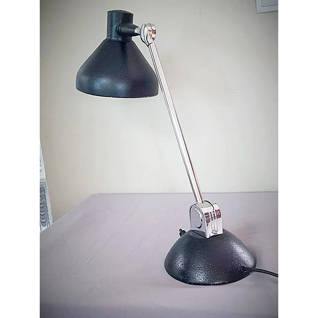 Industrial desk lamp of Jumo, France around 1938. Chrome and painted aluminum. Adjustable adjustable arm and head. The...