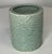 Celadon brush pot with dragon relief. Motif is soft and calming. Flowers, foliage, clouds and dragon are featured....