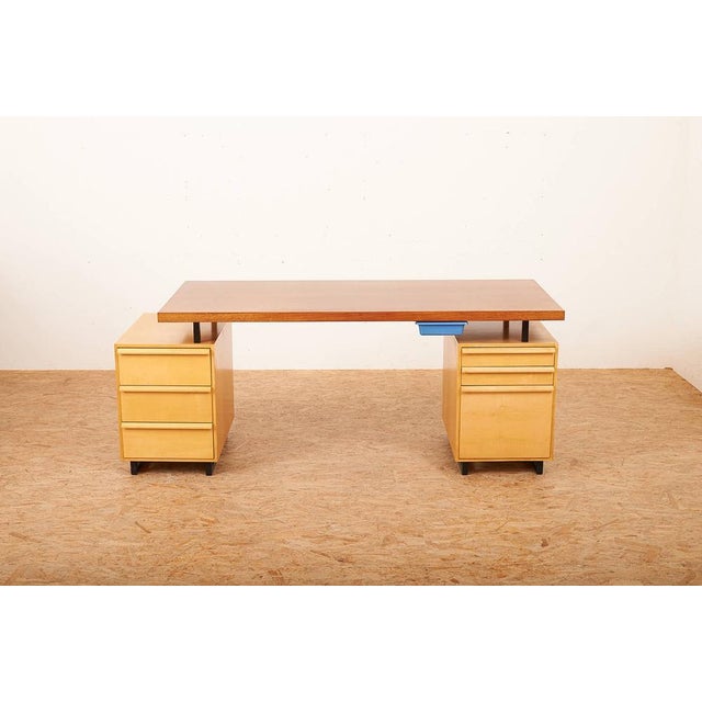 Desk "Model 10", 1956. 2 pcs. drawer carcasses of maple with metal runners painted black, worktop teak veneer loosely...