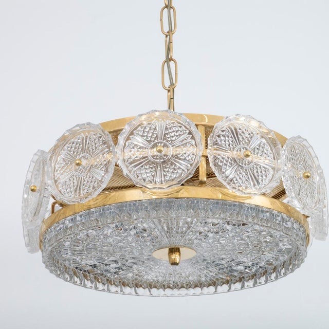 Molded glass and brass pendant by Carl Fagerlund for Orrefors