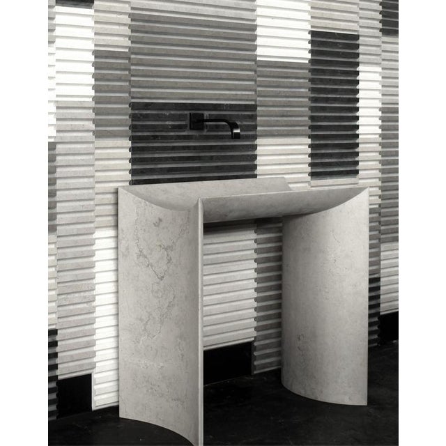 Trilite Washbasin in White Carrara Marble by Bufalini Marmi Dimensions: D 42,5 x W 80 x H 80 cm. Materials: Carrara...
