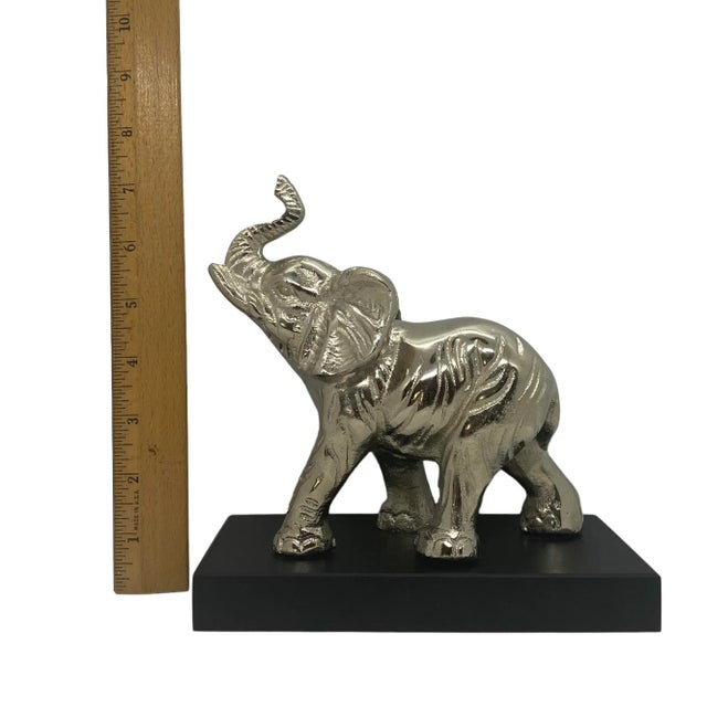 Contemporary Silver Aluminum Metal Elephant Sculpture Standing on Black Wood Plinth For Sale - Image 9 of 12