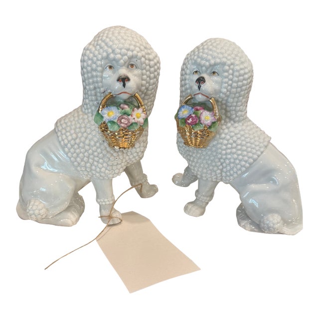 Vintage German Porcelain Spaghetti Poodle Figurines With Floral Baskets - A Pair For Sale