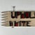 A gorgeous and unique 19th Century handmade and hand painted trade sign for the White Co. establishment advertising...