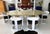 A set of four "Jackie Onassis" chairs by Karl Springer, circa 1980s. Finished in glossy white lacquer and upholstered in a...