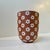 Signature design vase by Edith Nielsen - Zeuthen Denmark circa 1950s. Red clay body decorated with white flowers. The...