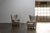 High-back wing chair by Mogens Lassen from the 1940s. These examples were made in the early 50s. Dark-stained beech wood...