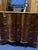 The craftsmanship is a masterclass in early European veneer work. The top surface, drawer fronts, and side panels are...