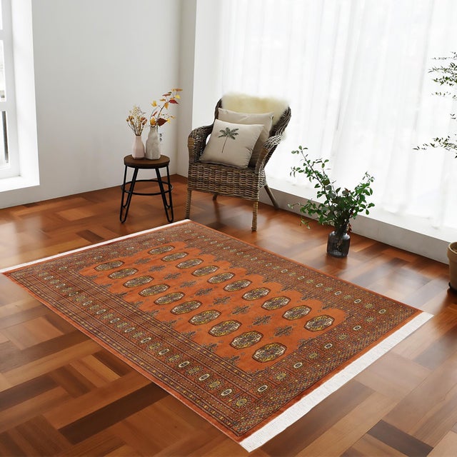 Transform the interior of your home with a beautiful hand-knotted Bokhara rug. Meticulously crafted with intricate...
