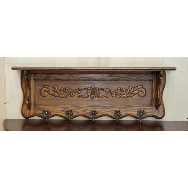 Dutch oak wall hanging coat hat and scarf rack with French Royalty head gold gilt brass hooks A very good looking well...