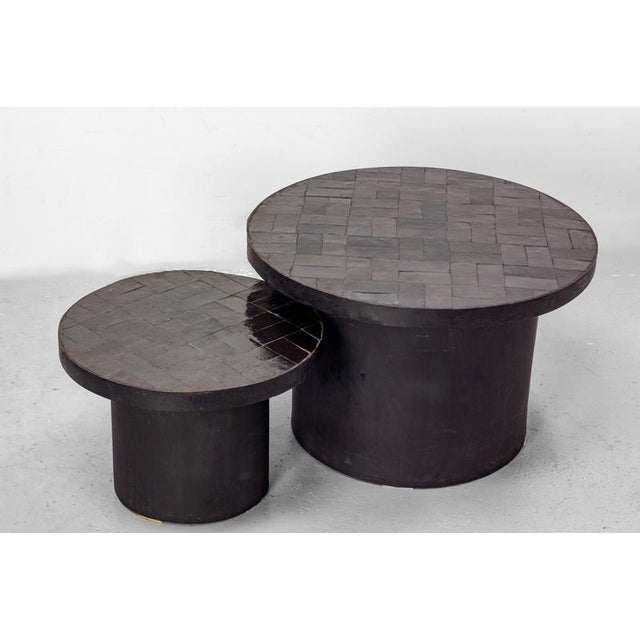 Pair of Moroccan coffee tables made of black zellige from the 1960s A beautiful pair of nesting coffee tables of Moroccan...