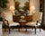 A refined pair of cream leather armchairs by Kreiss, showcasing an elegant interpretation of classic English Chippendale...