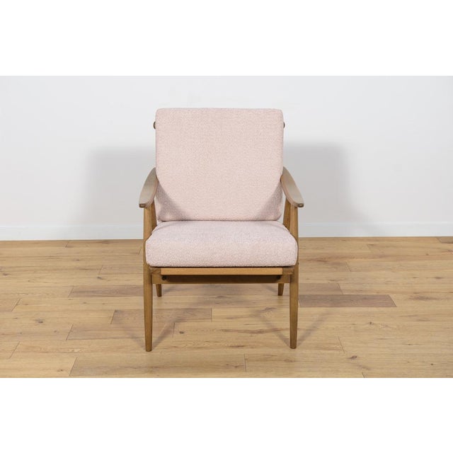 The armchair was produced by the Czechoslovak company TON in the 1960s. The beech elements have been cleaned from the old...
