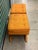 Striking pair of vintage circa 1970s fully upholstered X-base ottomans in the iconic Billy Baldwin style. The pair retains...