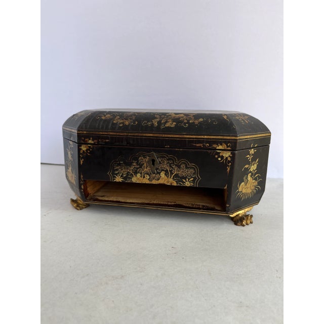 Single octagonal shaped Chinese export footed wood sewing box with single removable drawer and removable tray. Features...