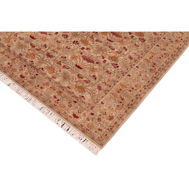 Designed with mesmerizing intricacy and gorgeous color palette, this hand-knotted masterpiece demonstrates the beauty and...
