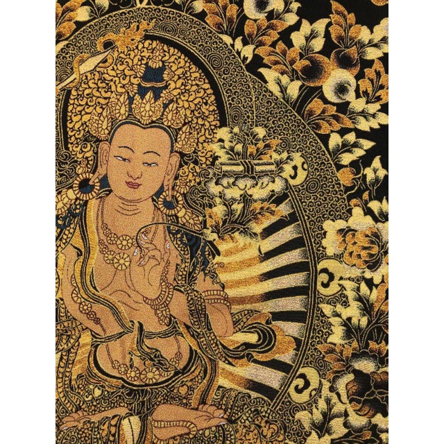 "W-60cm,H-90cm This Xizang Embroidery and Brocade Thangka Buddha Painting is a handmade spiritual home decor piece...