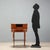 Small open writing desk in bois de rose, crafted in France at the beginning of the 20th century, featuring an elegant oval...