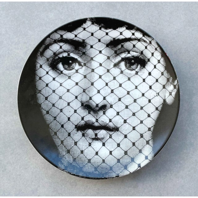 Vintage Piero Fornasetti "Tema e Variazioni" porcelain plate depicting the face of the famous opera singer Lina Cavalieri,...