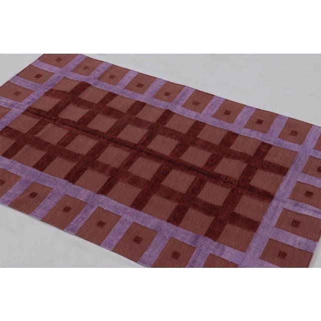 Handwoven in cotton, this 3x5 Dhurrie flatweave rug from India is a bold and contemporary expression of geometric design....