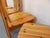 4 vintage chairs from the 70s and 80s, in the style of Charlotte Perriand for Les Arcs, in pine, ergonomic shape of the...