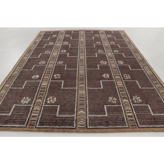 Hand-knotted in wool, this 9x12 contemporary Art Deco rug is a sophisticated addition to Rug & Kilim’s collection. It...