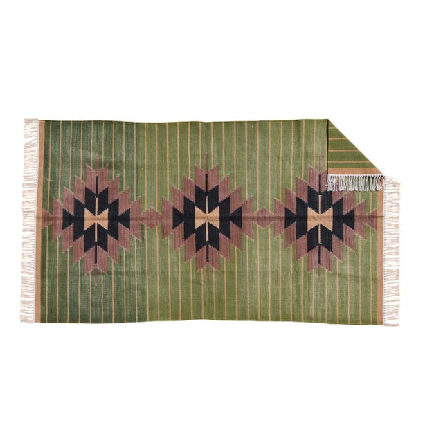 Presenting our Regal Dalia Collection! Made from naturally dyed 100% cotton yarn, these dhurrie rugs have been handwoven...