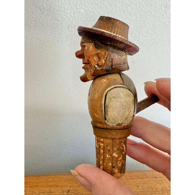 Rare circa 1920s vintage hand-carved and hand-painted cork wine stopper. The man has a charmingly painted face, hat, and...