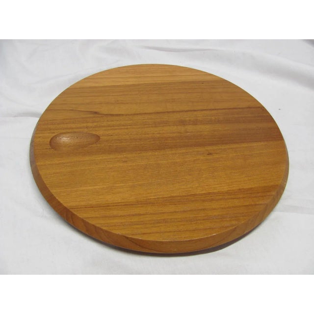 !970s Danish Modern Round teak cheeseboard / serving tray. Made by DANSK International Designs. The design is by Vivianna...