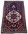 A lovely antique tribal rug, woven by the Lors tribe circa 1900. The design features a single floral medallion on a deep...