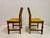 A set of six dining chairs designed by Henning Kjærnulf, crafted in solid oak and dating from the 1960s. The chairs...