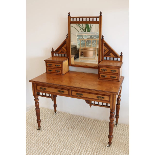 This 1800's Victorian antique vanity in the Eastlake style would be the perfect accent piece in any space. Mirror is in...