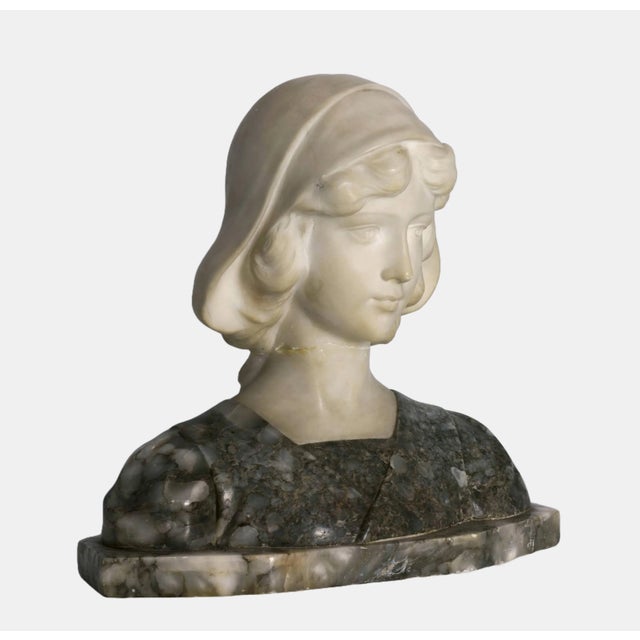 Anonymous, bust of a young woman, c. 1900, artificial marble and gray onyx marble. 37 cm (height) x 37 cm (width) x 22 cm...