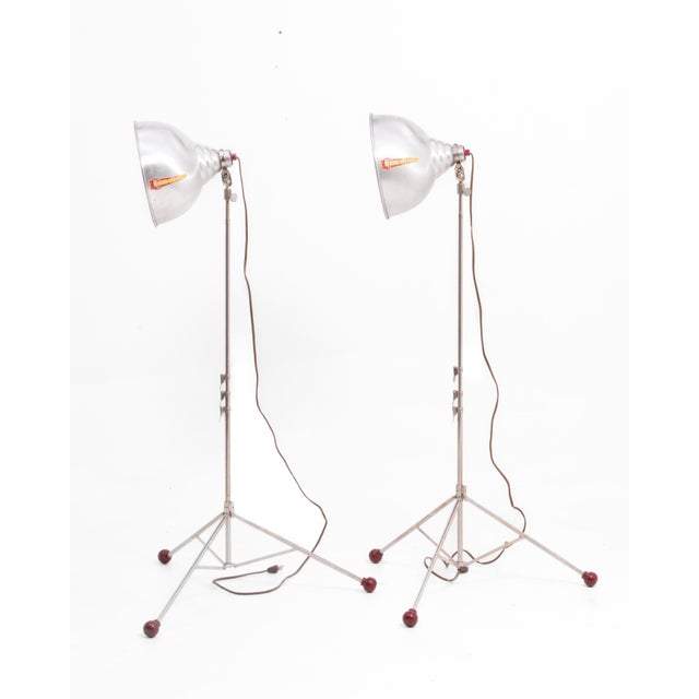 A pair of fantastic Acme-Lite Chicago Photo floor lamps. The lamps are being sold individually. Each lamp bears the early...