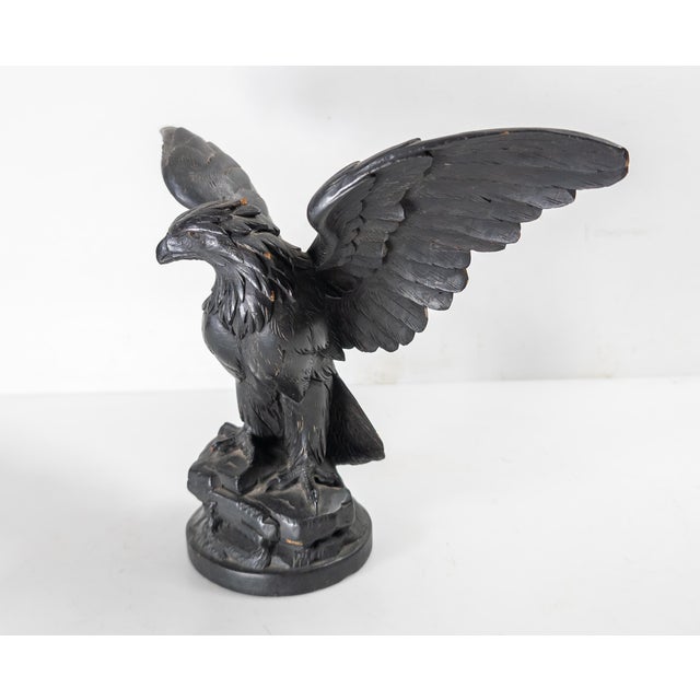 We are selling this nice little 19th century carved Black Forest Eagle. This swiss facrinv features a well carved walnut...
