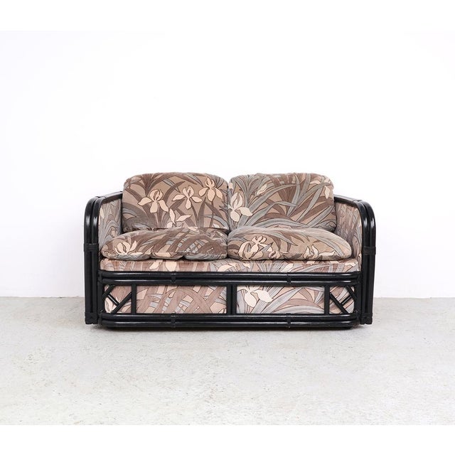 Vintage bamboo two-seater bench from the 1970s. this compact two-seater vintage bench from the 1970s exudes pure boho...