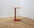Easy Boy designer side table by Segis. Entirely made of orange-tinted metal. Minor imperfections. Height 62 cm. This piece...