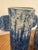 The Paros Blue Vase Set has a Mediterranean feel, thanks to the reactive glaze on the blue ceramic vases. The texture...