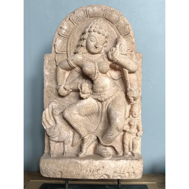 An exquisitely carved South Asian sandstone sculpture of dancing Hindu Goddess, possibly Saraswati or Parvati, mounted on...