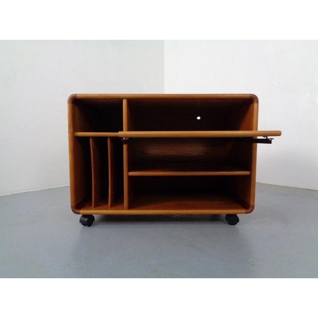 Small, rollable sideboard with pull-out shelf from Dyrlund in teak. I have official proof of authenticity such as vintage...