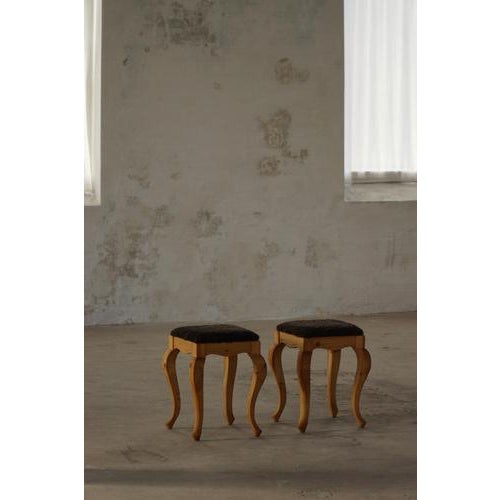 A charming pair of Scandinavian stools crafted in solid pine, combining traditional craftsmanship with a warm and inviting...